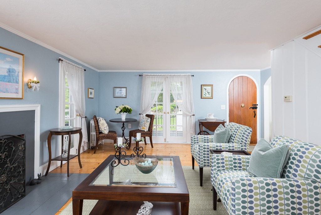68 Cross Street Hingham, MA 02043 - Photo 12 of 26 a living room with furniture fireplace and dining table