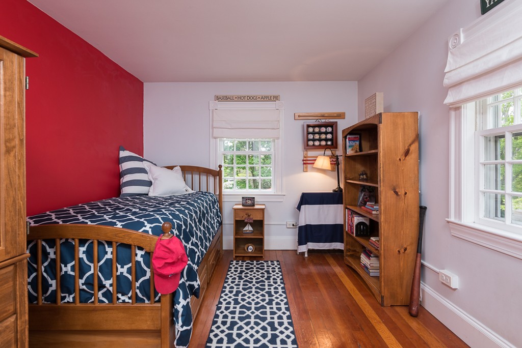 68 Cross Street Hingham, MA 02043 - Photo 14 of 26 a bedroom with a bed and wooden floor