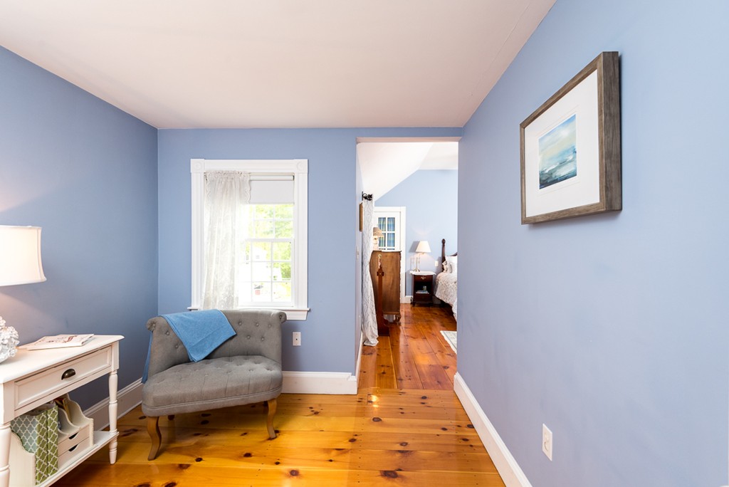 68 Cross Street Hingham, MA 02043 - Photo 16 of 26 a living room with furniture and a rug