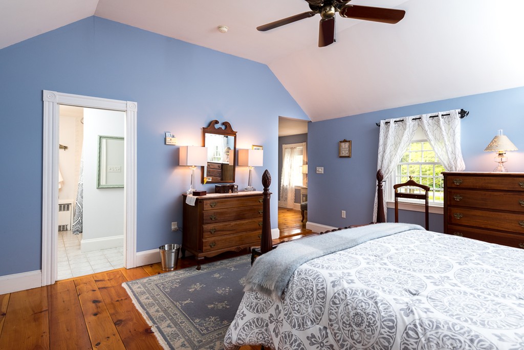 68 Cross Street Hingham, MA 02043 - Photo 18 of 26 a bedroom with a bed and a dresser