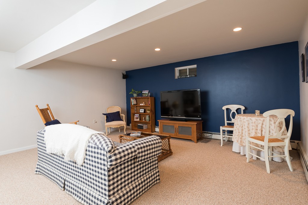 68 Cross Street Hingham, MA 02043 - Photo 20 of 26 a living room with furniture and a flat screen tv