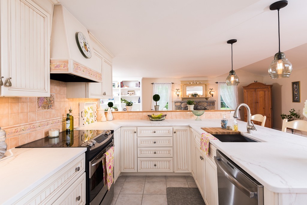 68 Cross Street Hingham, MA 02043 - Photo 8 of 26 a kitchen with stainless steel appliances granite countertop a sink a stove and a wooden floors