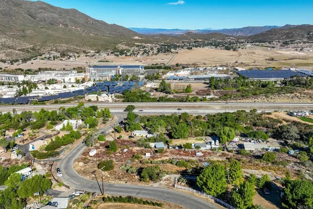 an aerial view of mountain with residential space