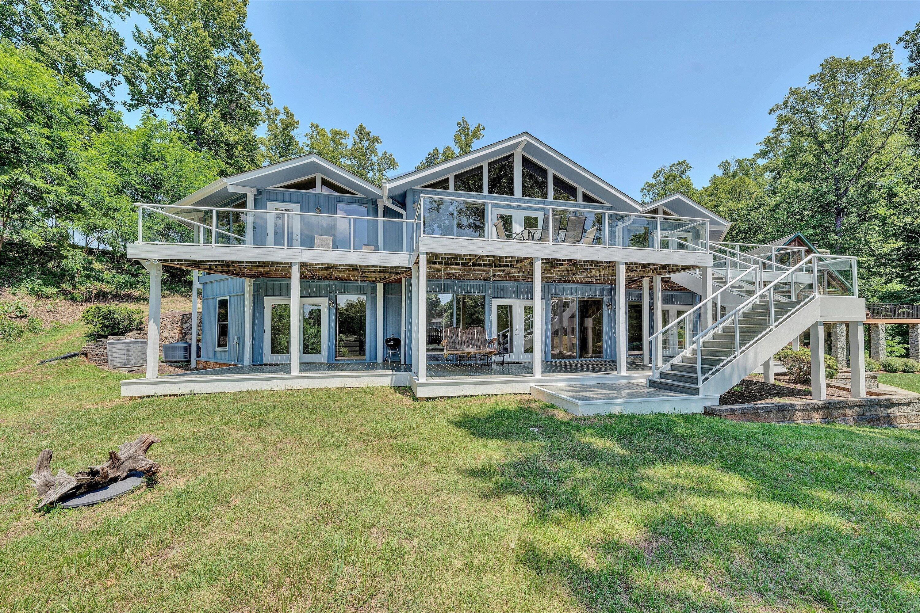 207 Winding Way Union Hall, VA 24176 - Photo 48 of 60 a view of a house with a yard and sitting area
