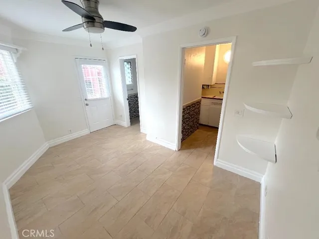 en empty room with windows