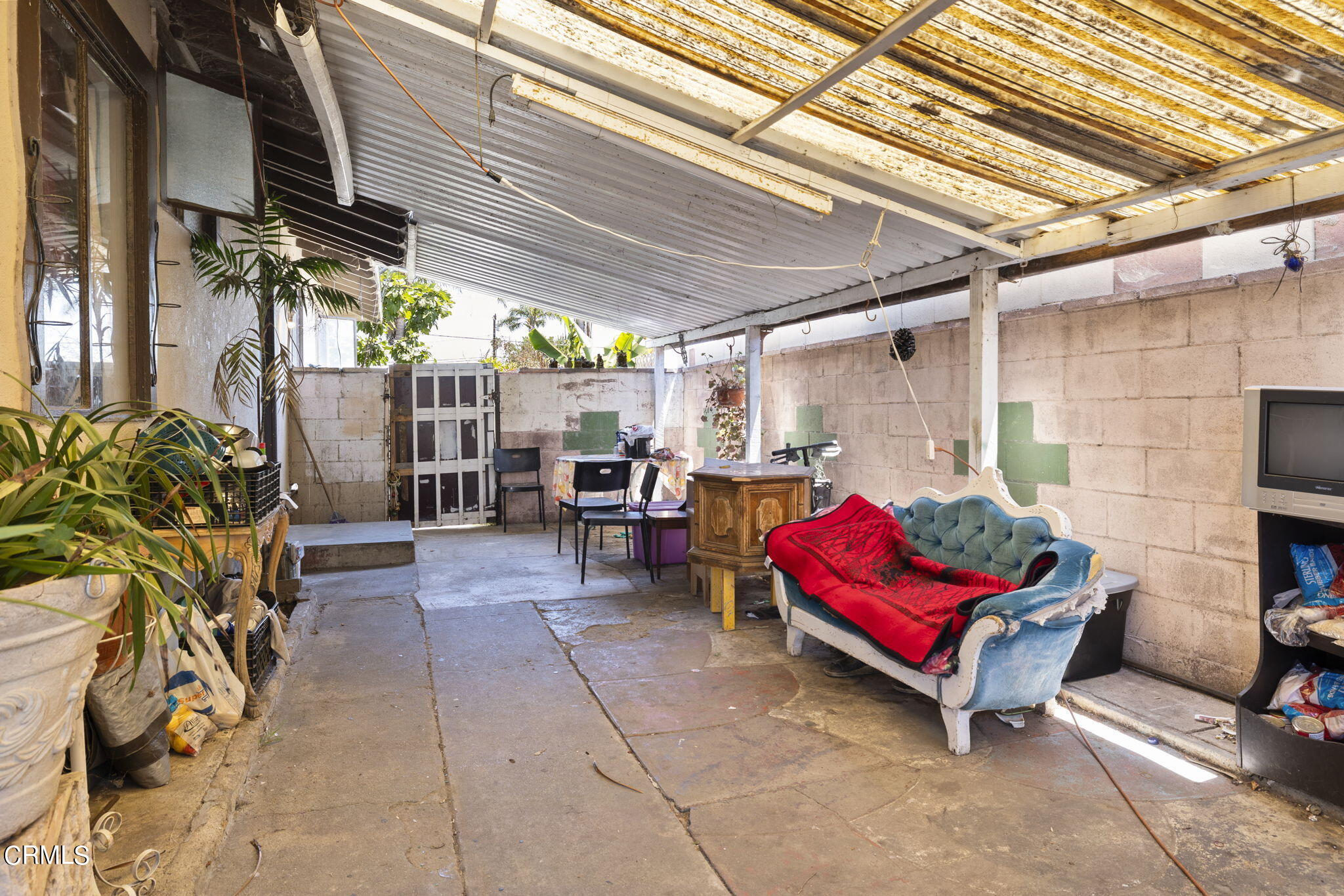 4829 Saviers Road Oxnard, CA 93033 - Photo 27 of 31 a building outdoor space with patio furniture and potted plants