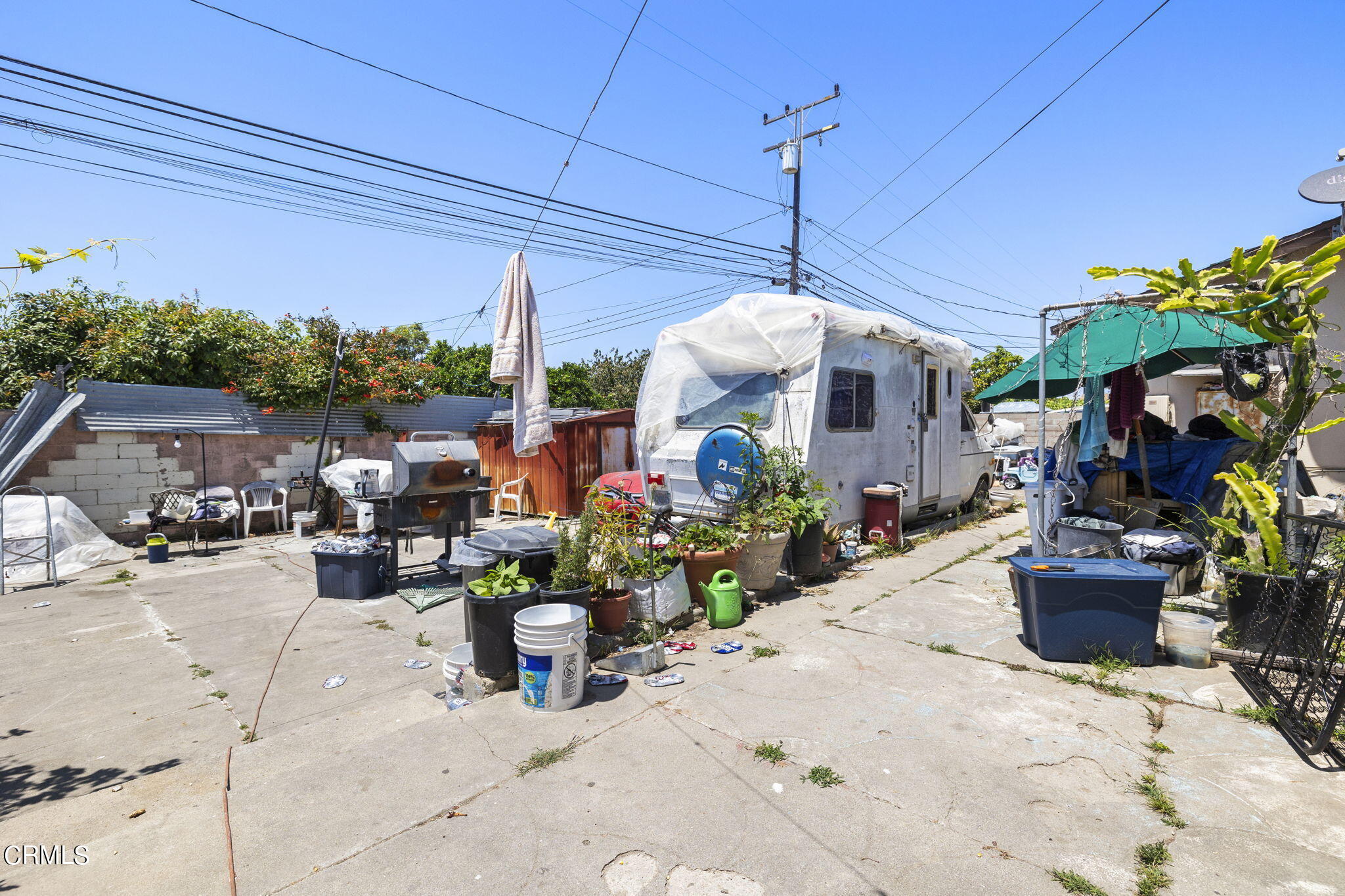 4829 Saviers Road Oxnard, CA 93033 - Photo 28 of 31 a view of a patio with plants and chairs