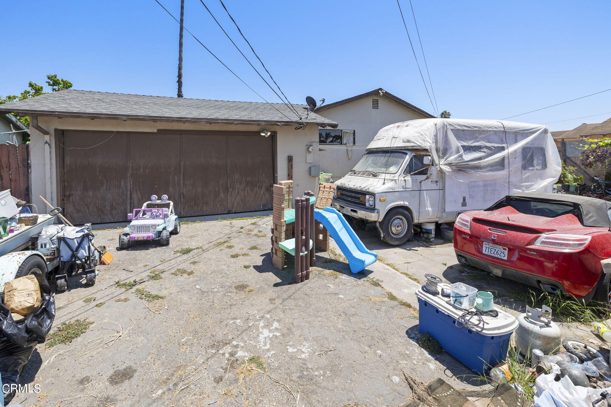 4829 Saviers Road Oxnard, CA 93033 - Photo 30 of 31 a car parked in front of house
