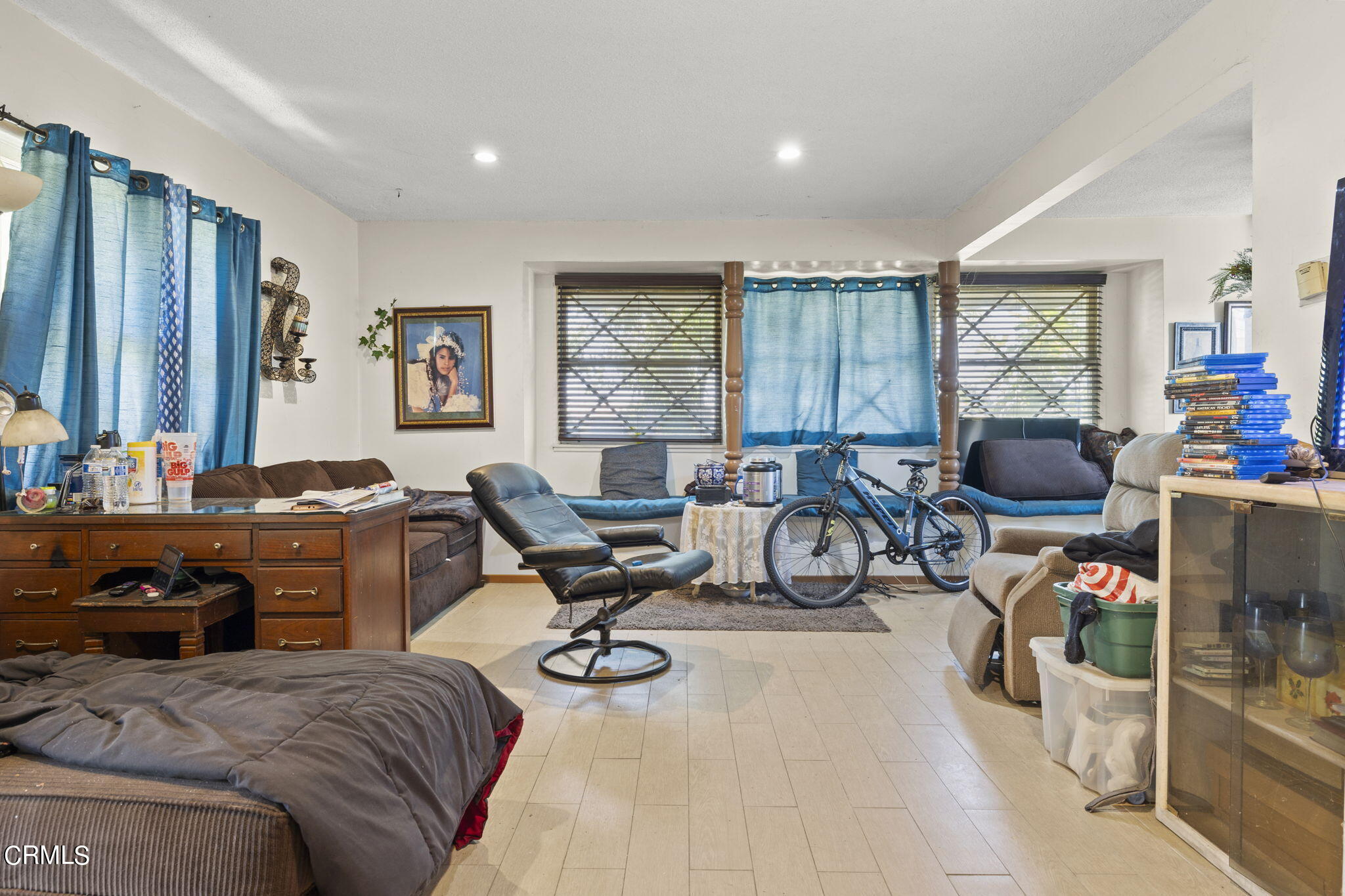 4829 Saviers Road Oxnard, CA 93033 - Photo 10 of 31 a bed room with furniture and a window