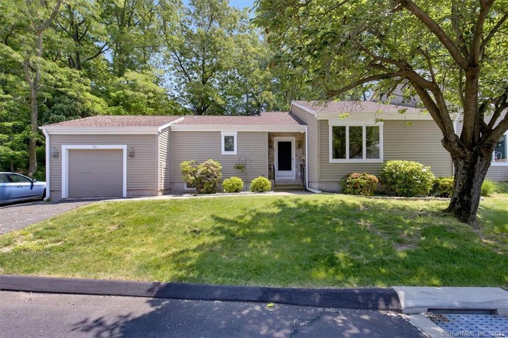 161 Village Road, Unit 161 Southington, CT 06489 - Photo 1 of 1 front view of a house with a yard
