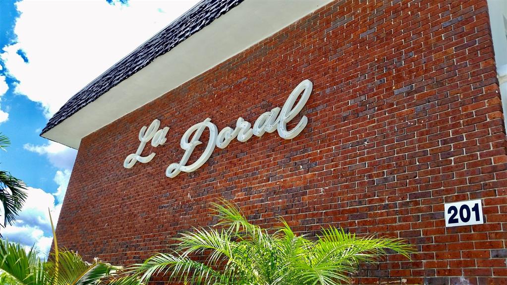 201 Inlet Way Palm Beach Shores, FL 33404 - Photo 4 of 9 a sign on the wall