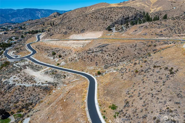 a view of a large body of water and mountain