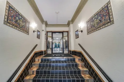 a view of gallery with windows