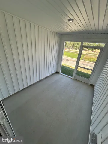 a kitchen with stainless steel appliances granite countertop a refrigerator a stove a sink and a microwave