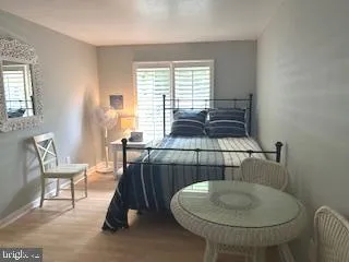 a workspace with furniture and window