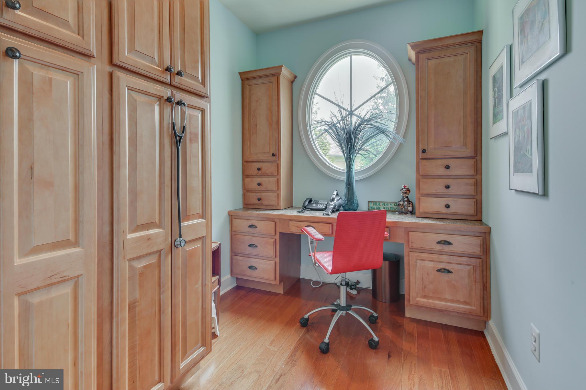 7706 Elmwood Road Fulton, MD 20759 - Photo 10 of 30 a view of a room with furniture and wooden floor