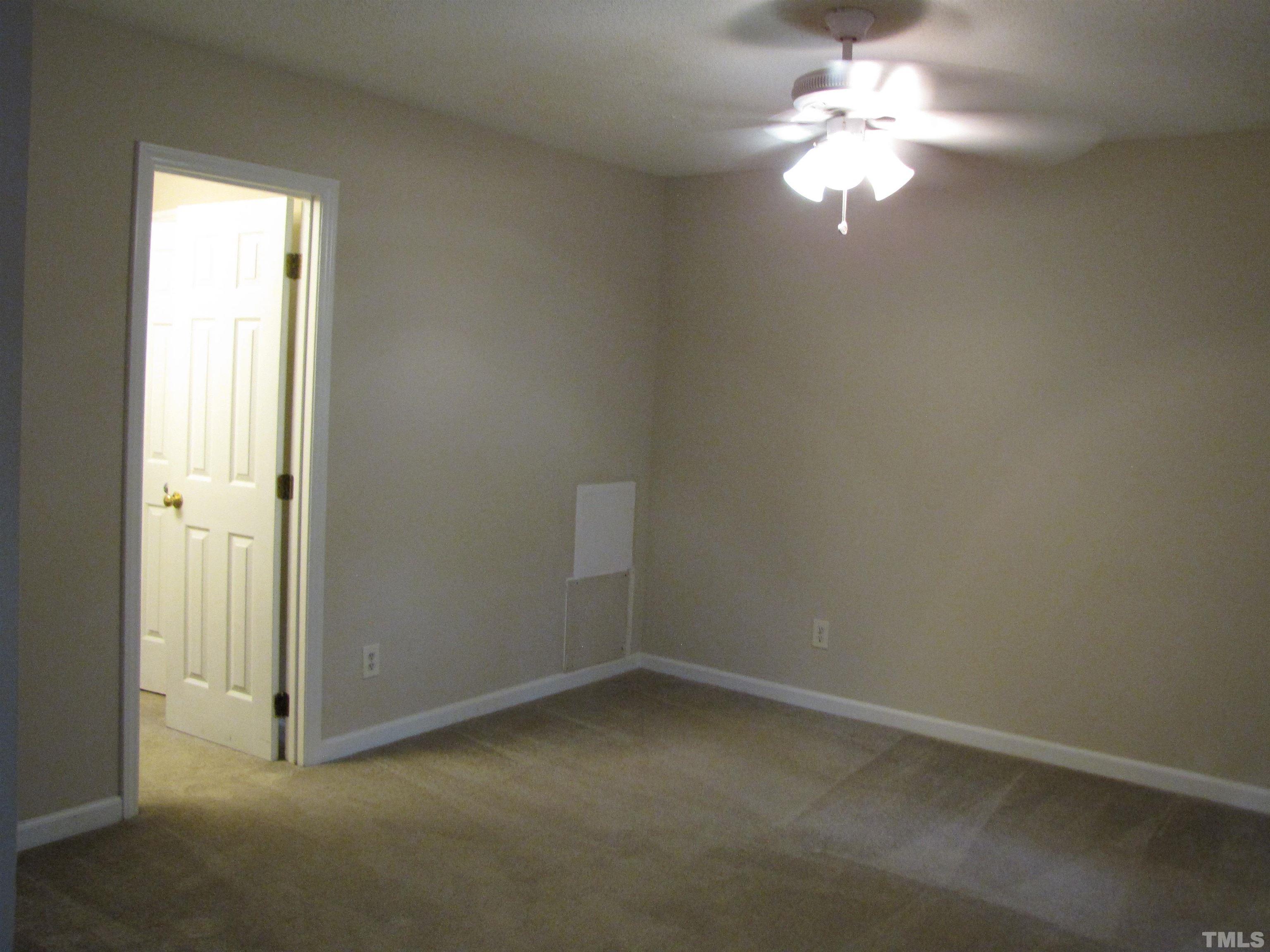 2 Carson Circle, Unit B Durham, NC 27705 - Photo 11 of 15 an empty room with a window