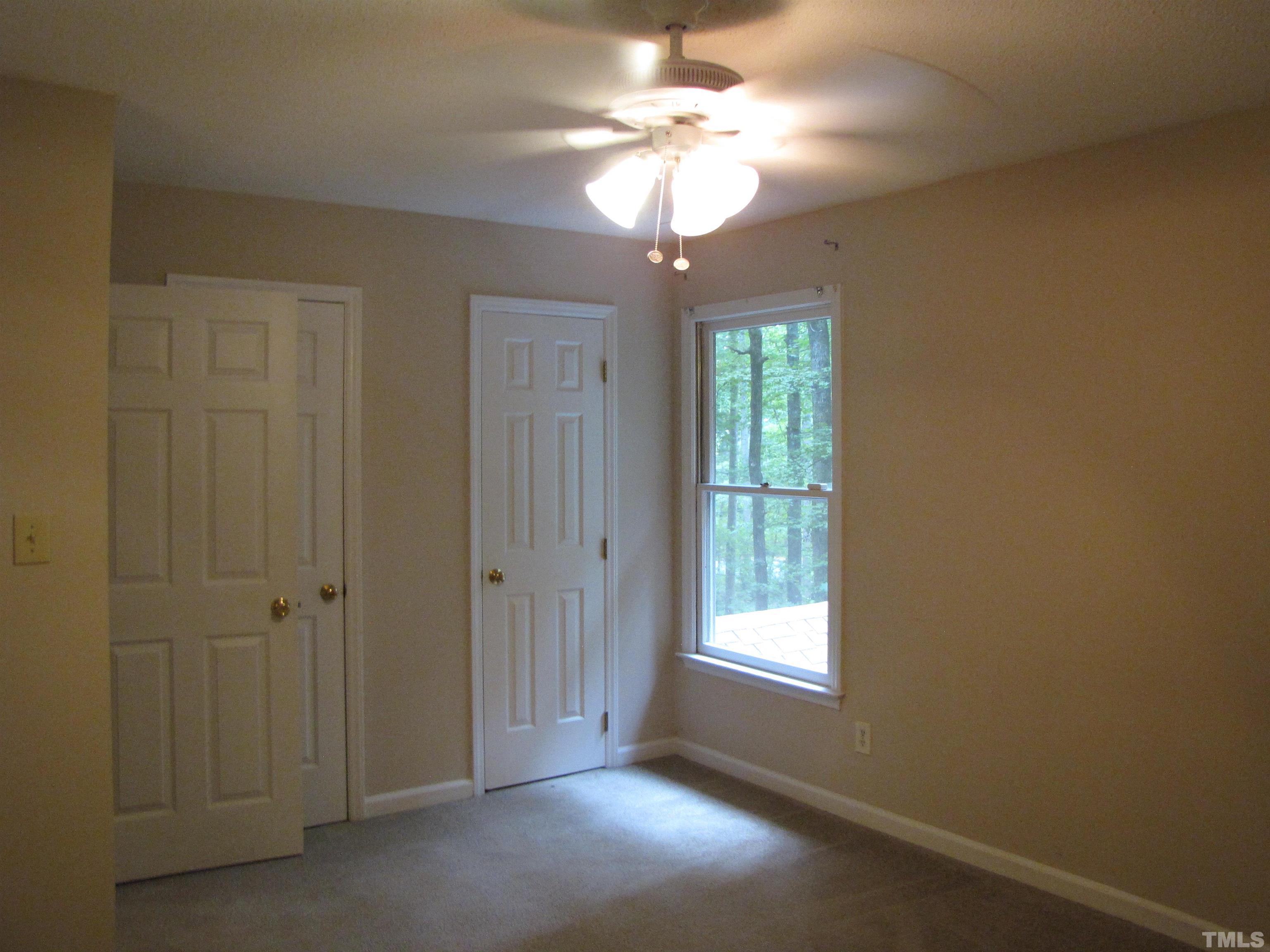 2 Carson Circle, Unit B Durham, NC 27705 - Photo 12 of 15 a view of a chandelier fan and entryway