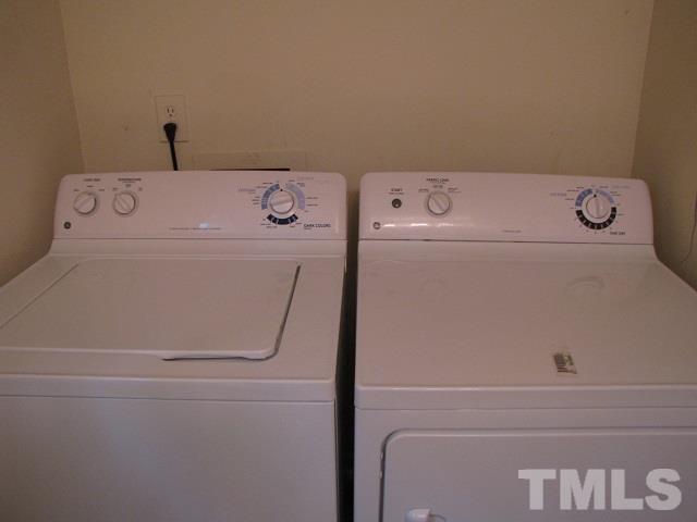2 Carson Circle, Unit B Durham, NC 27705 - Photo 14 of 15 a utility room with dryer and washer