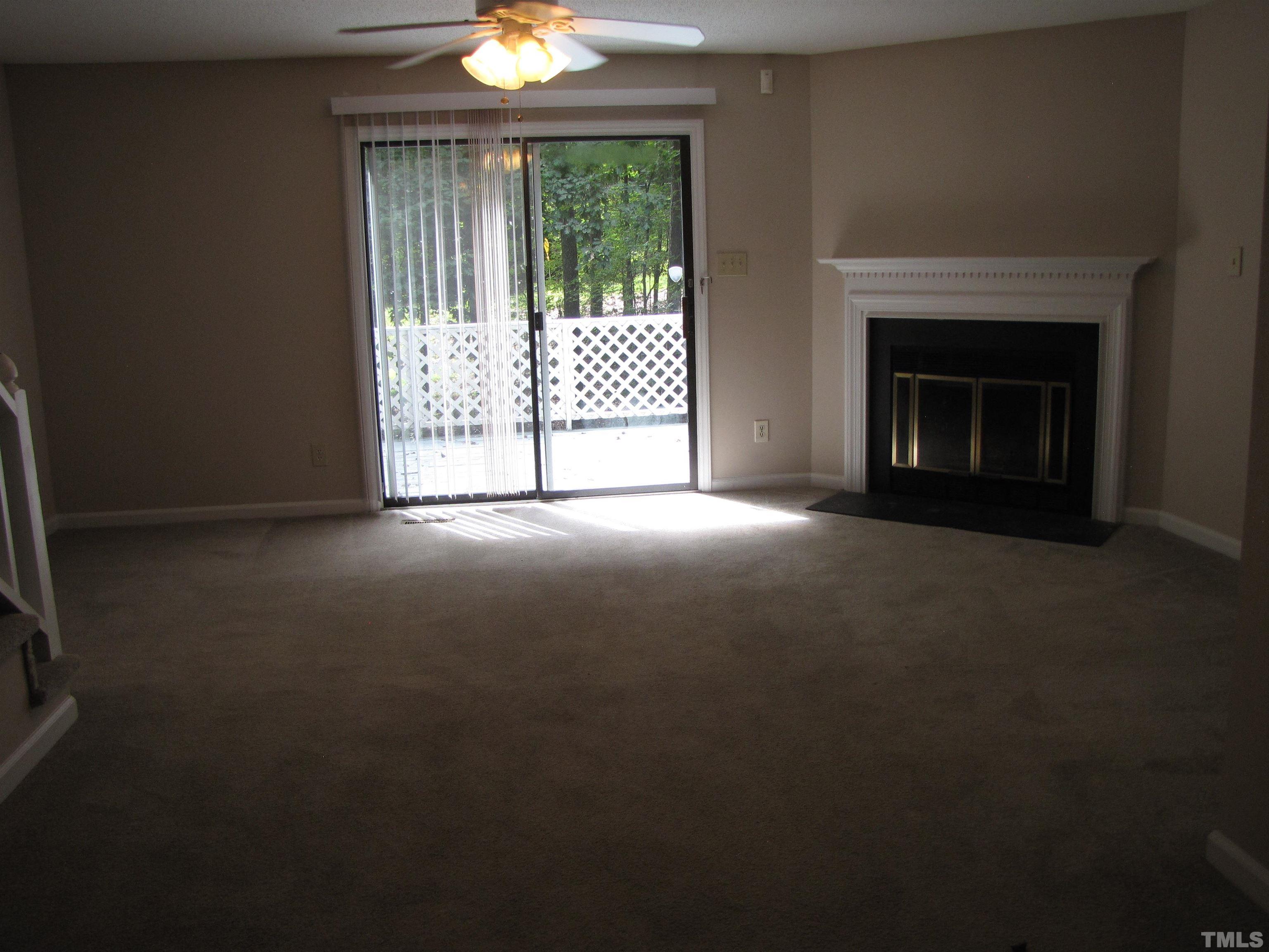 2 Carson Circle, Unit B Durham, NC 27705 - Photo 5 of 15 a view of an empty room with windows