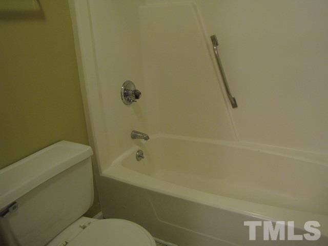 2 Carson Circle, Unit B Durham, NC 27705 - Photo 10 of 15 a bathroom with a shower and a toilet