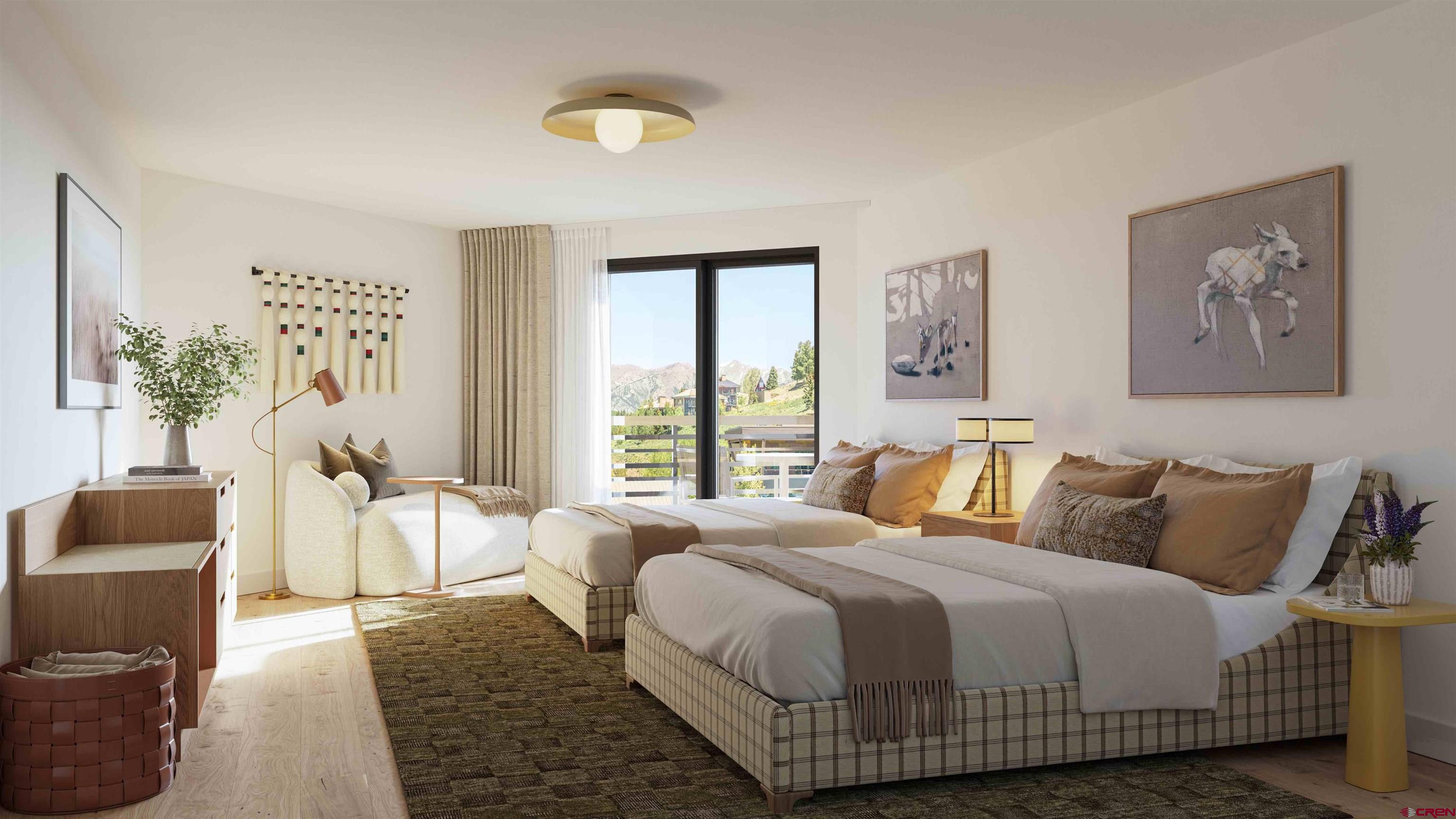 500 Gothic Road, Unit 602 Crested Butte, CO 81225 - Photo 7 of 20 a bedroom with a bed and a couch