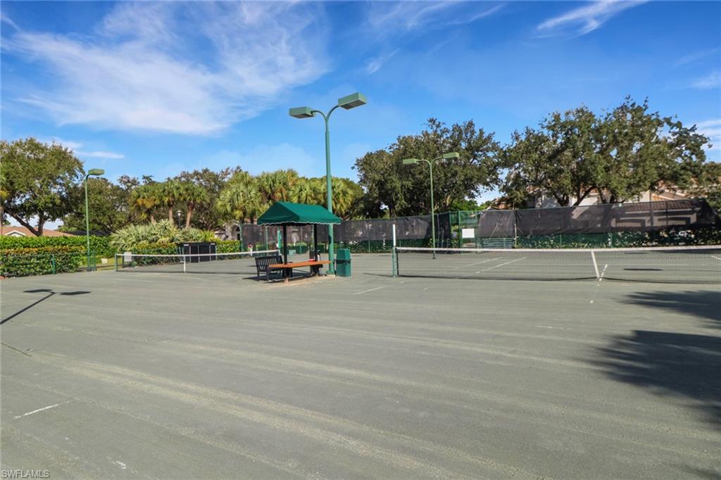 6923 Satinleaf Road North, Unit 101 Naples, FL 34109 - Photo 30 of 50 a view of a street