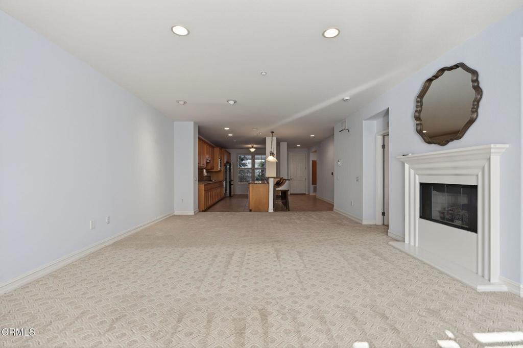1423 Windshore Way Oxnard, CA 93035 - Photo 28 of 64 a view of a livingroom with a fireplace and window