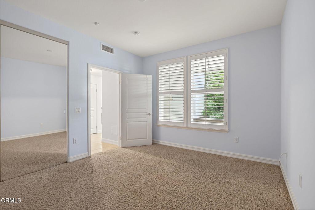 1423 Windshore Way Oxnard, CA 93035 - Photo 49 of 64 a view of an empty room with a window