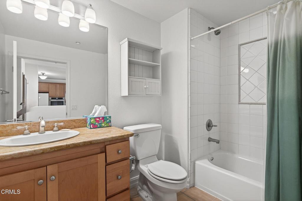 1423 Windshore Way Oxnard, CA 93035 - Photo 50 of 64 a bathroom with a sink a toilet and shower