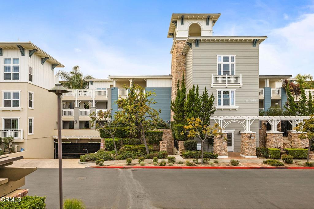 1423 Windshore Way Oxnard, CA 93035 - Photo 51 of 64 a front view of a building with street view