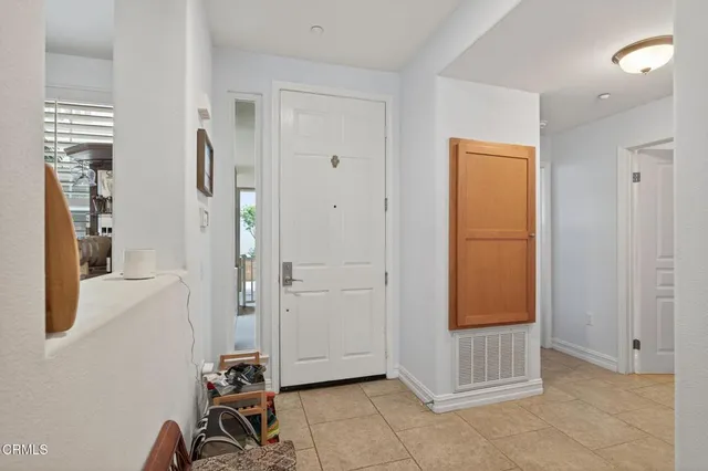 a view of a room with a large window