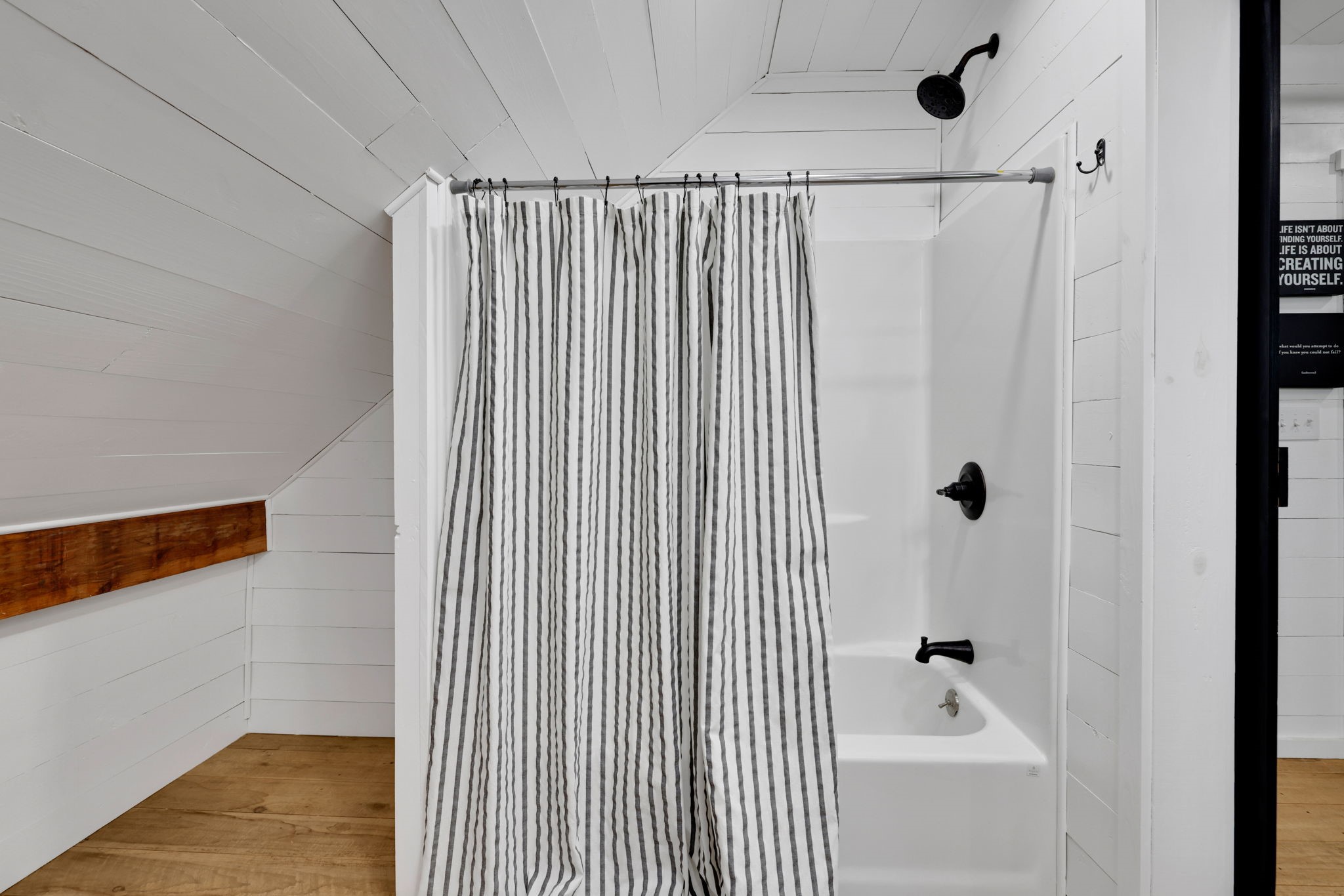 133 Timber Ridge Road Liberty, TX 77575 - Photo 22 of 29 a bathroom with a shower and a tub