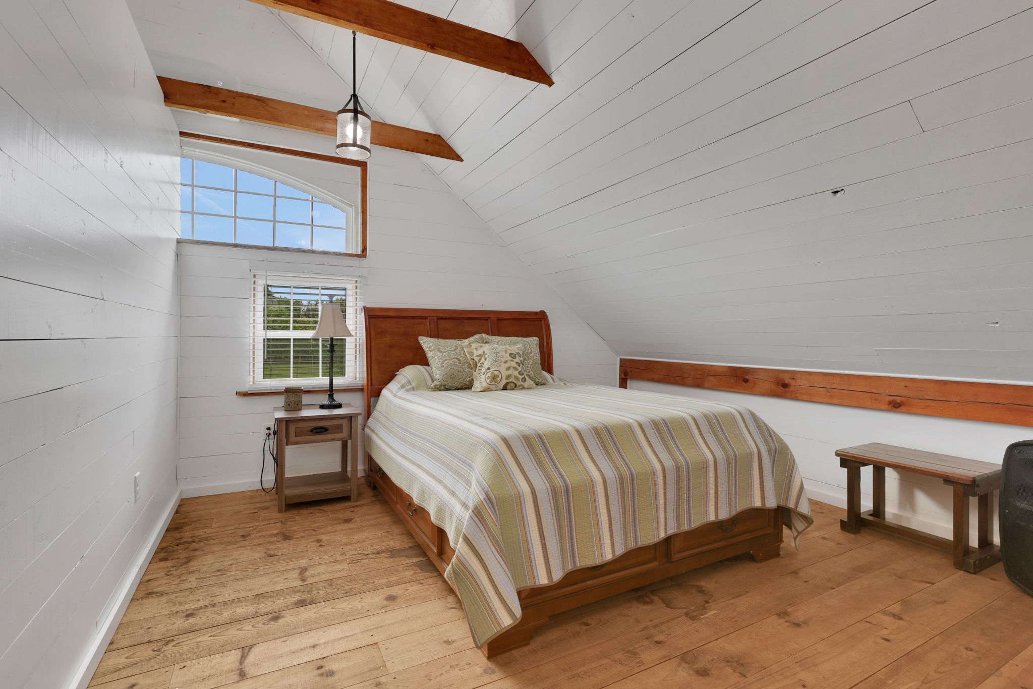 133 Timber Ridge Road Liberty, TX 77575 - Photo 25 of 29 a bedroom with a bed and a table