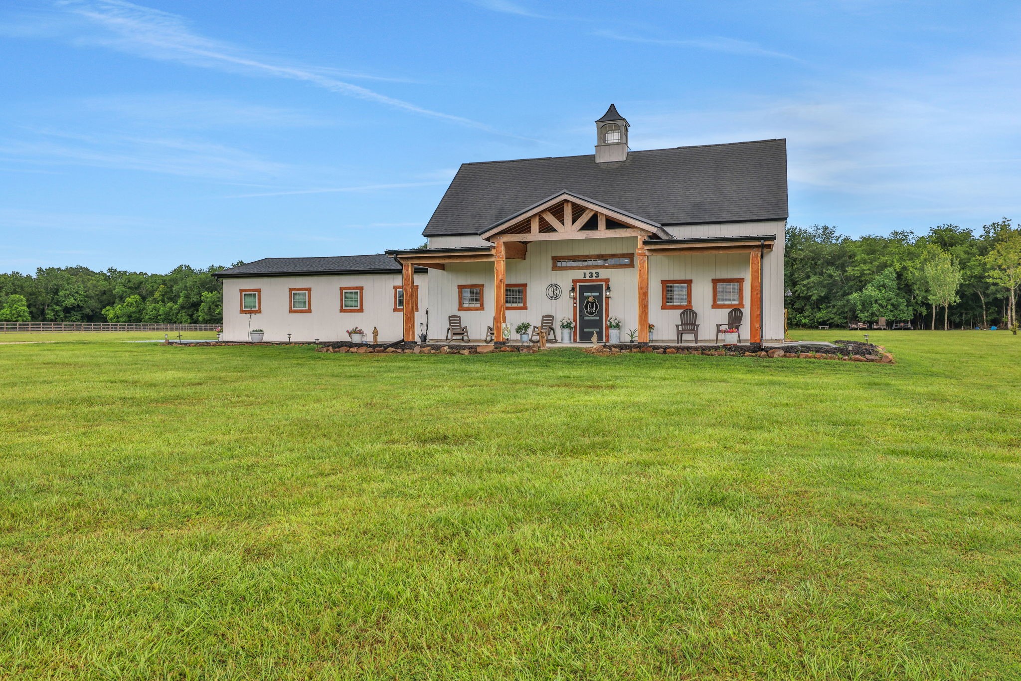 133 Timber Ridge Road Liberty, TX 77575 - Photo 28 of 29 a front view of a house with a yard