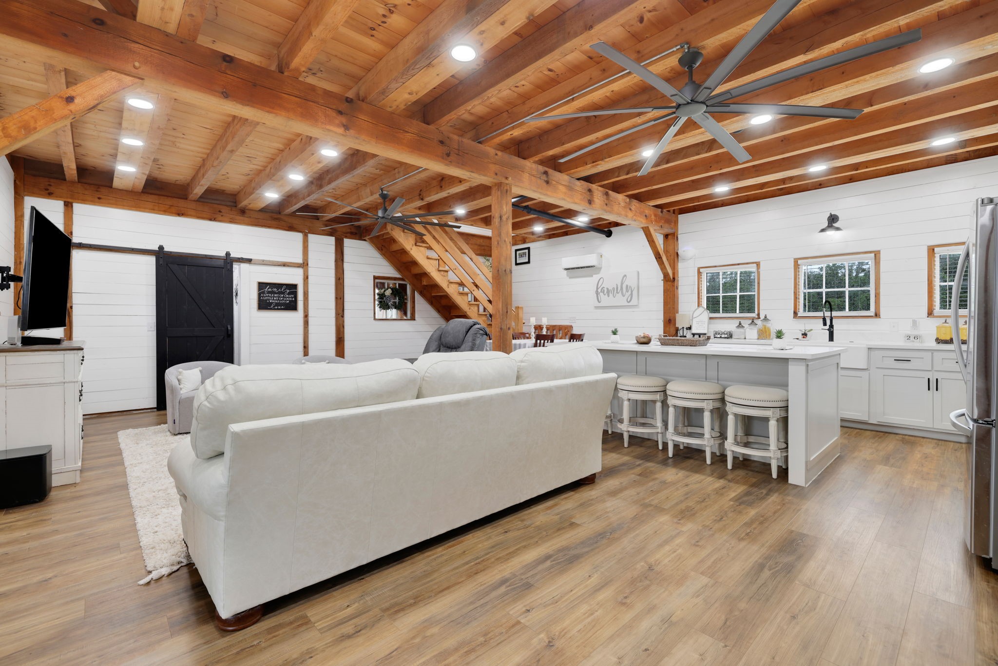133 Timber Ridge Road Liberty, TX 77575 - Photo 7 of 29 a living room with furniture and a wooden floor