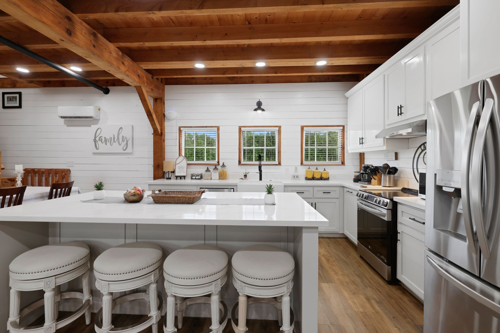 133 Timber Ridge Road Liberty, TX 77575 - Photo 9 of 29 a large kitchen with a table and chairs