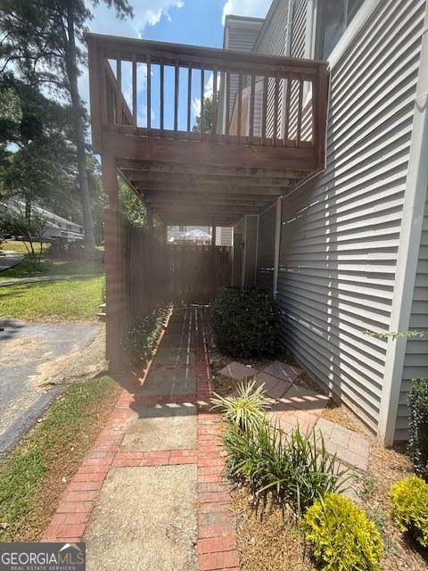 224 Twiggs Corners Peachtree City, GA 30269 - Photo 27 of 28 a view of wooden balcony and a yard