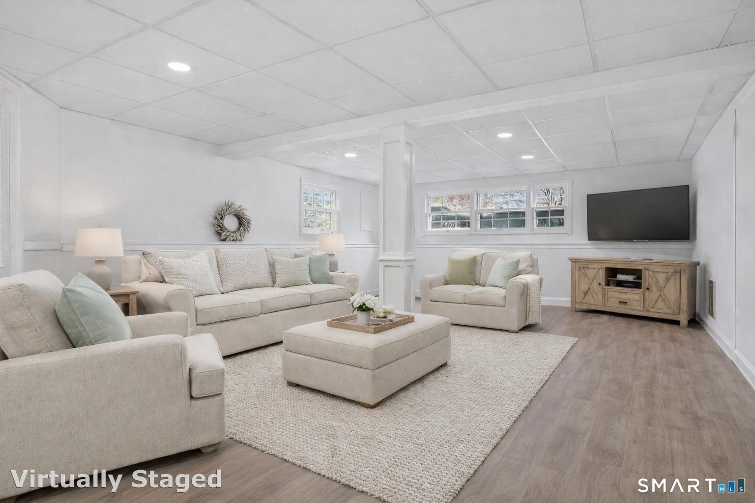 5 Kingswood Road Danbury, CT 06811 - Photo 23 of 36 Change drop ceiling tiles, add vinyl floor, box off pole