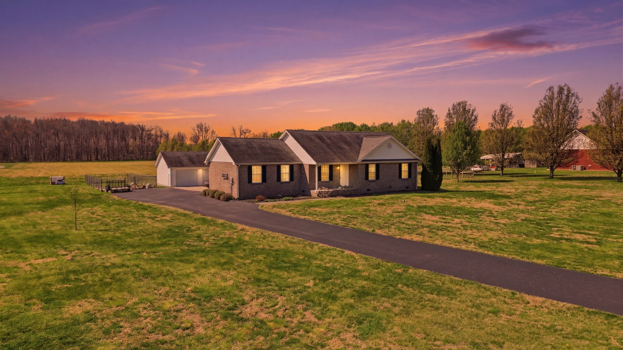 a view of houses with outdoor space and city view