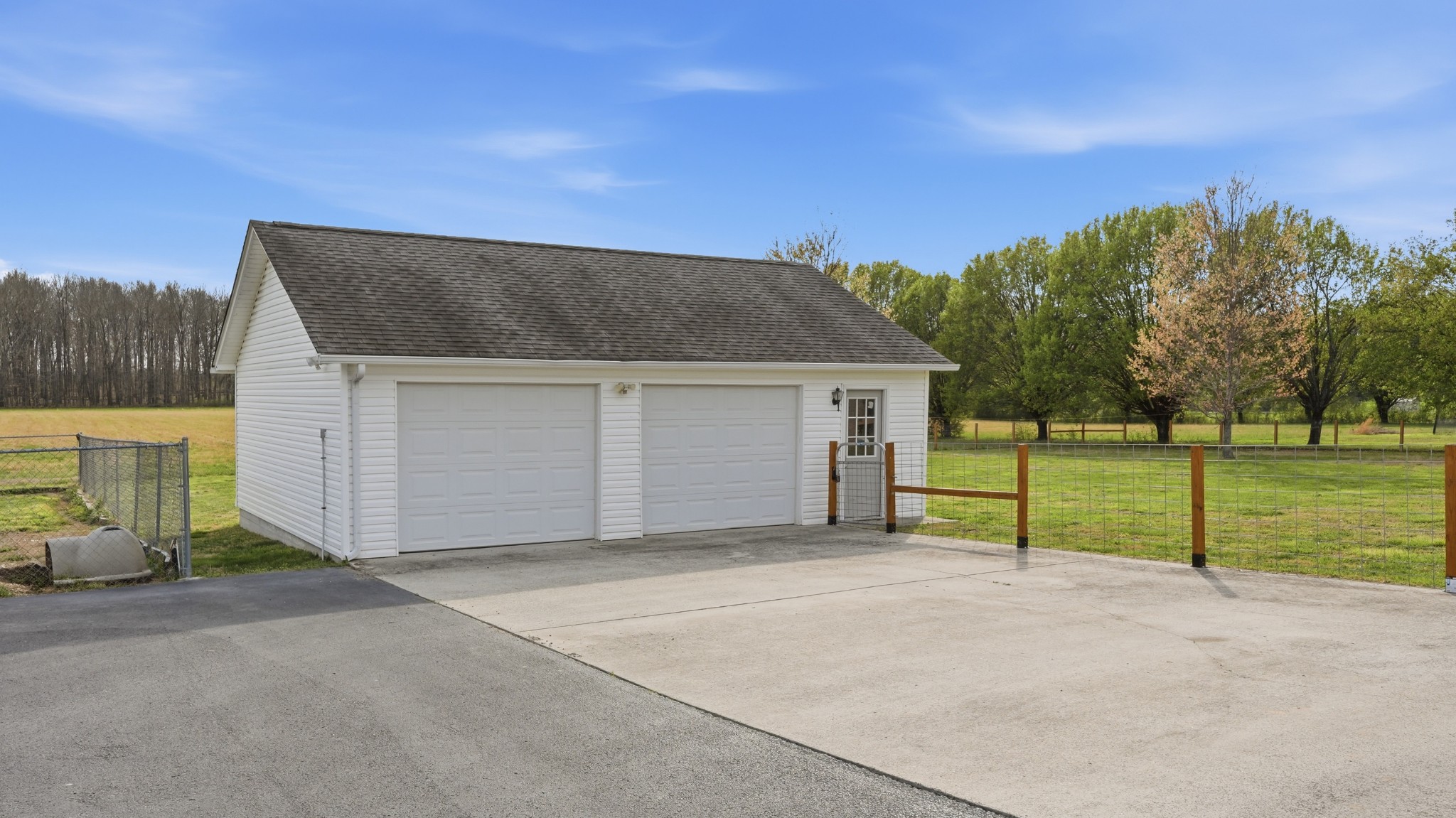 2877 Sixteenth Model Road Manchester, TN 37355 - Photo 11 of 38 a view of a house with backyard and trees