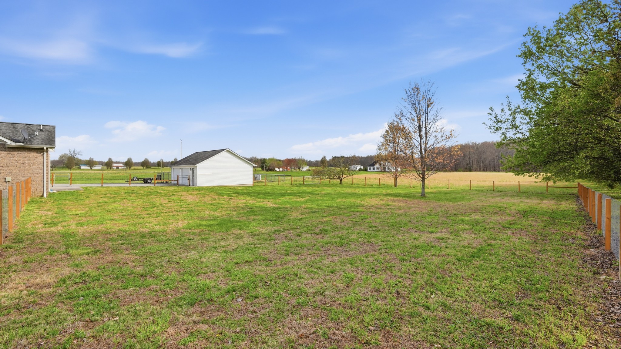 2877 Sixteenth Model Road Manchester, TN 37355 - Photo 13 of 38 a view of a field with a tree in the background