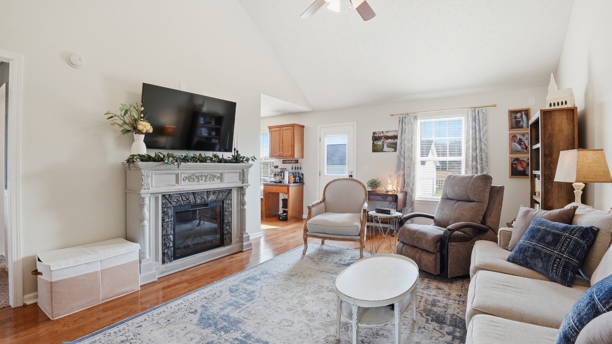 2877 Sixteenth Model Road Manchester, TN 37355 - Photo 19 of 38 a living room with furniture a fireplace and a flat screen tv