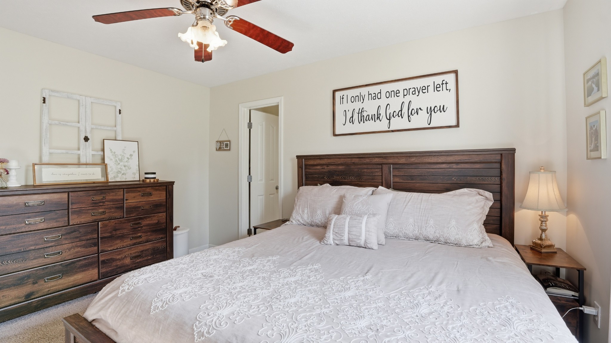 2877 Sixteenth Model Road Manchester, TN 37355 - Photo 25 of 38 a bedroom with a bed and a chandelier