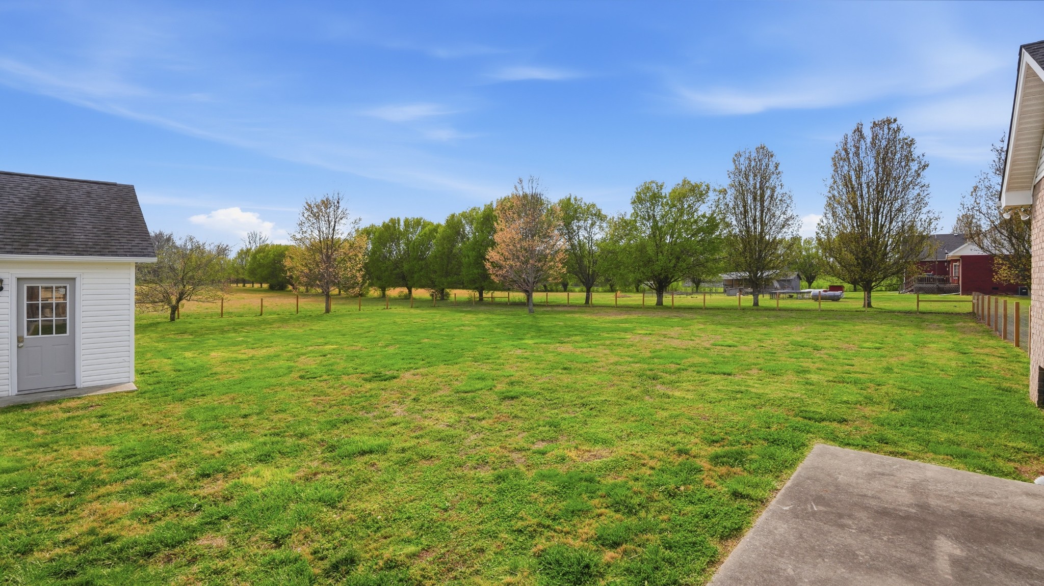 2877 Sixteenth Model Road Manchester, TN 37355 - Photo 10 of 38 a backyard of a house with lots of green space