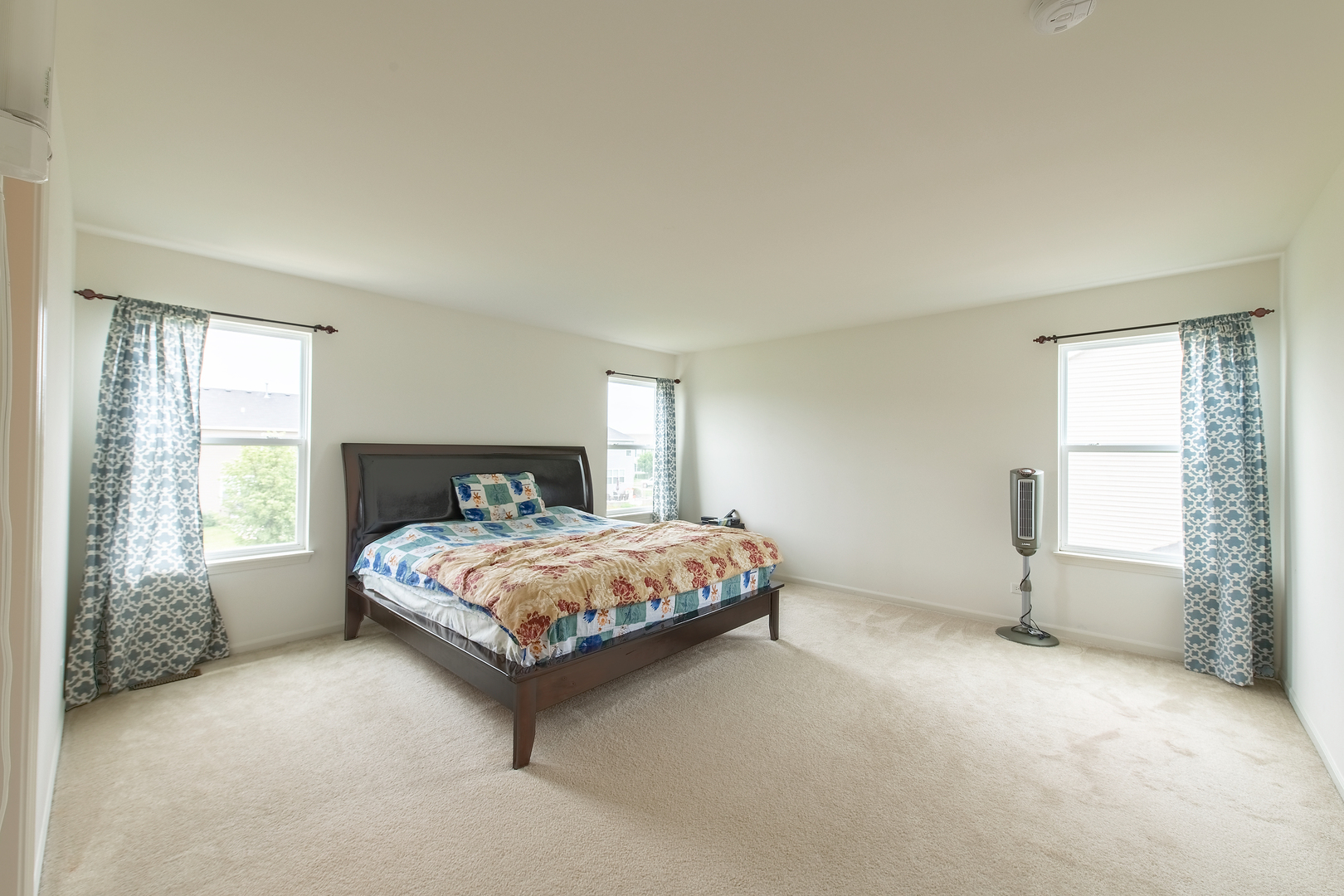 2692 Reedgrass Way Wauconda, IL 60084 - Photo 13 of 22 a bedroom with a bed lamp and window