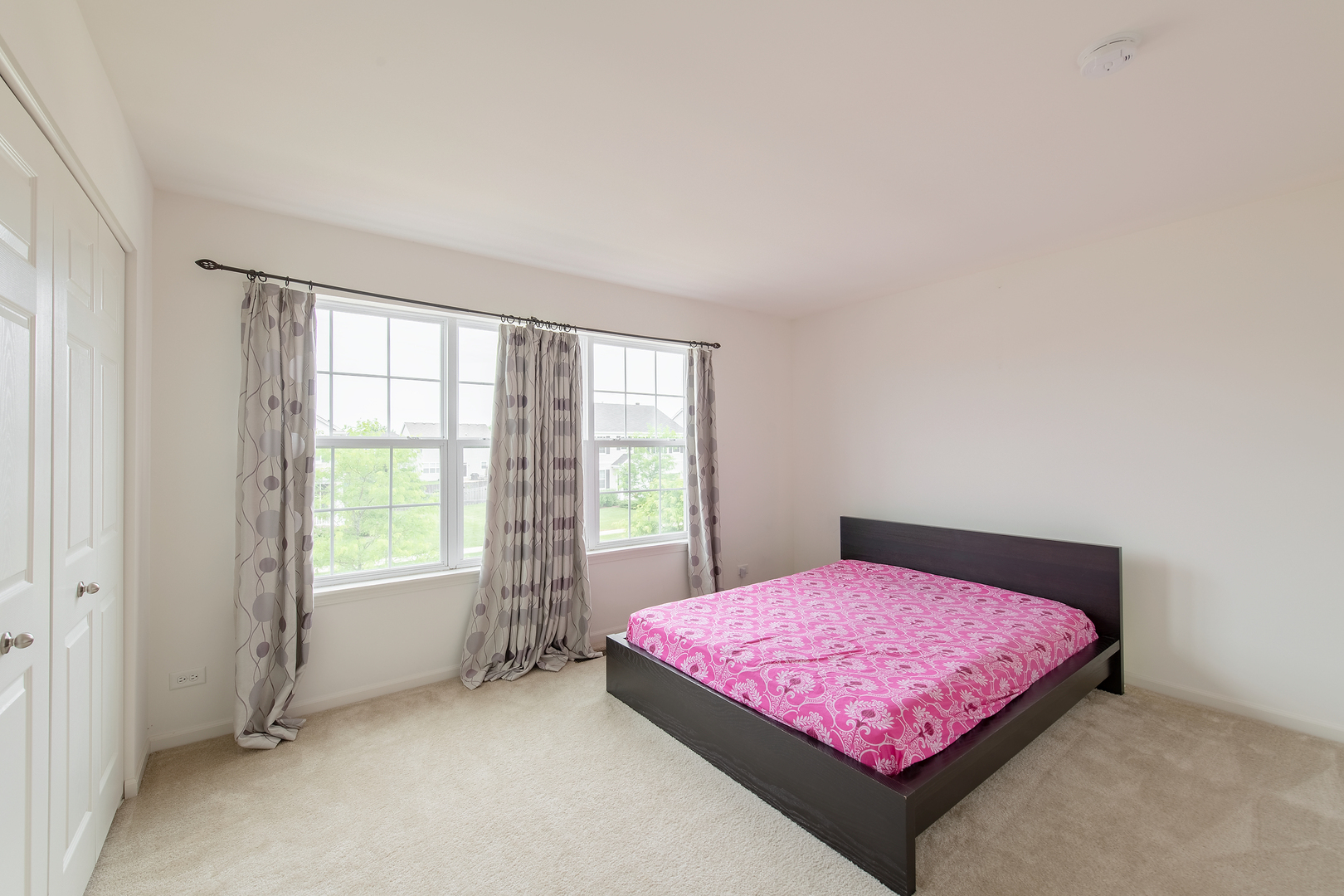 2692 Reedgrass Way Wauconda, IL 60084 - Photo 15 of 22 a bedroom with a bed and a window
