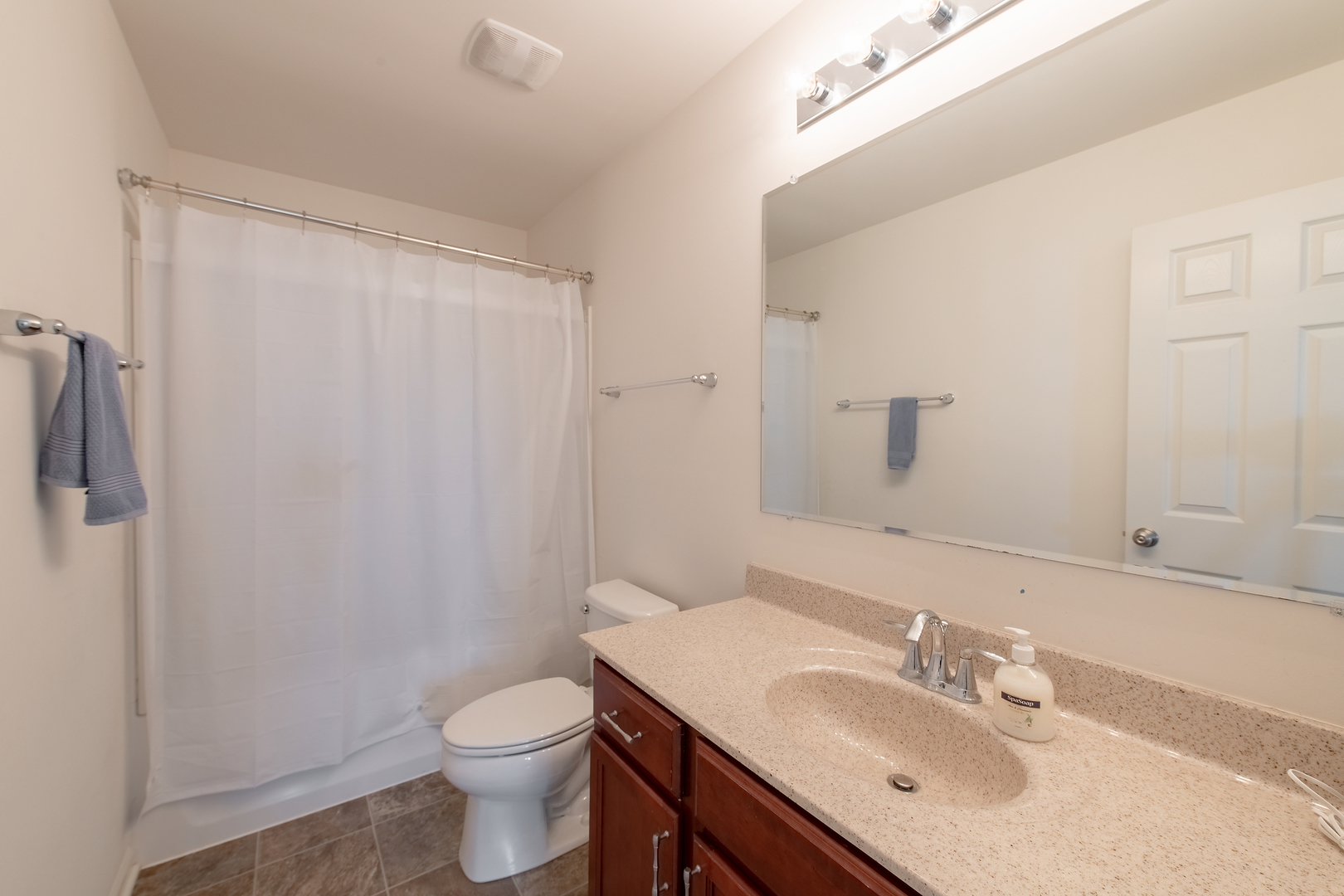 2692 Reedgrass Way Wauconda, IL 60084 - Photo 17 of 22 a bathroom with a sink toilet and a mirror