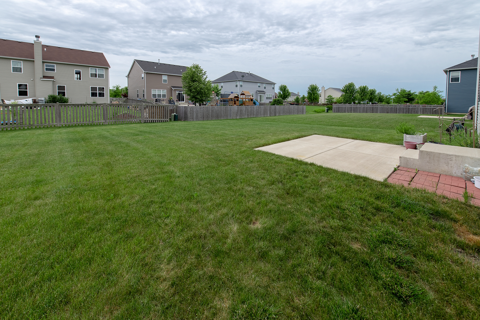 2692 Reedgrass Way Wauconda, IL 60084 - Photo 22 of 22 a view of a big house with a big yard and large trees