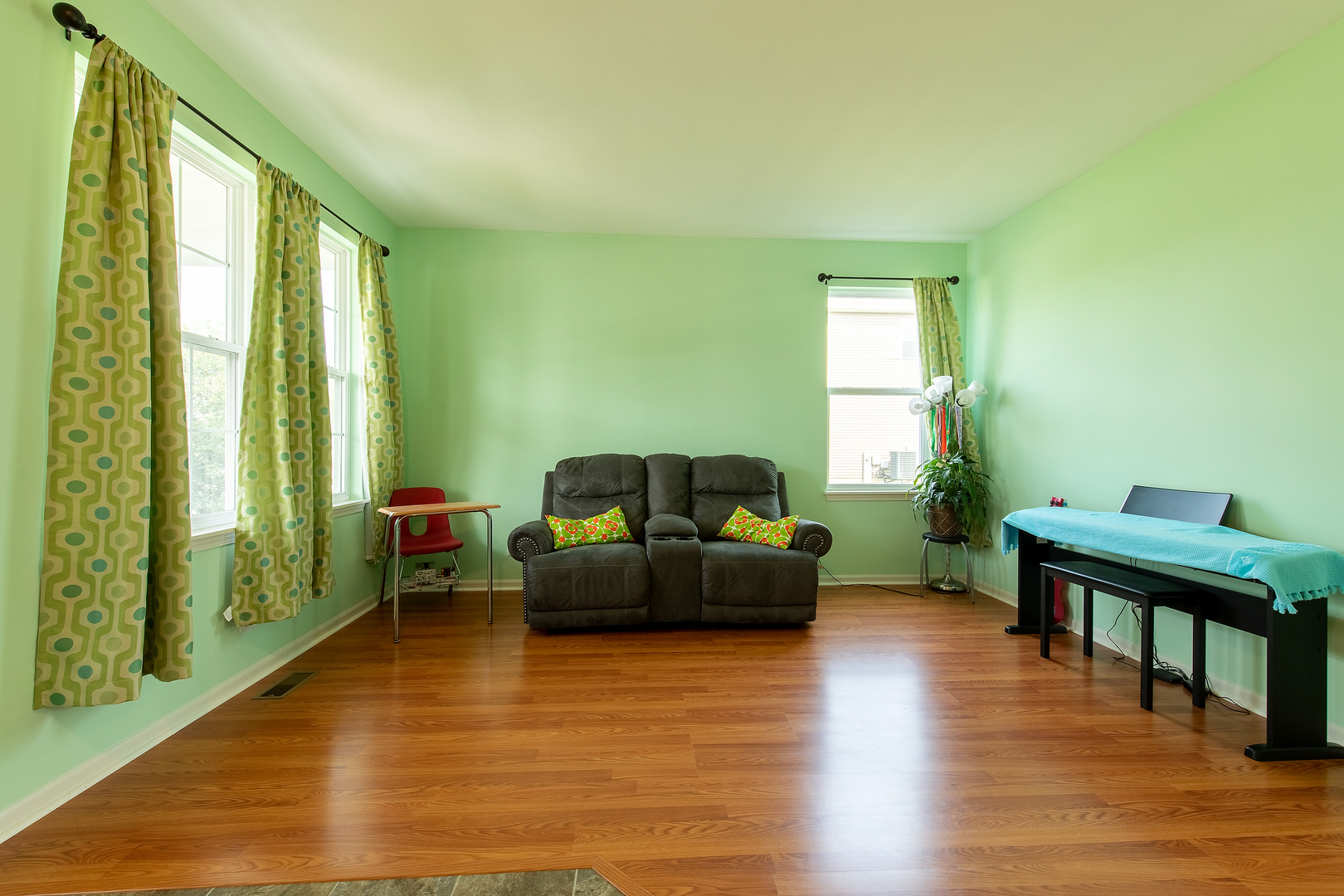 2692 Reedgrass Way Wauconda, IL 60084 - Photo 4 of 22 a living room with furniture and a wooden floor